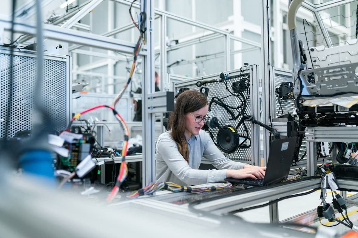 Engineer performing automotive quality inspection